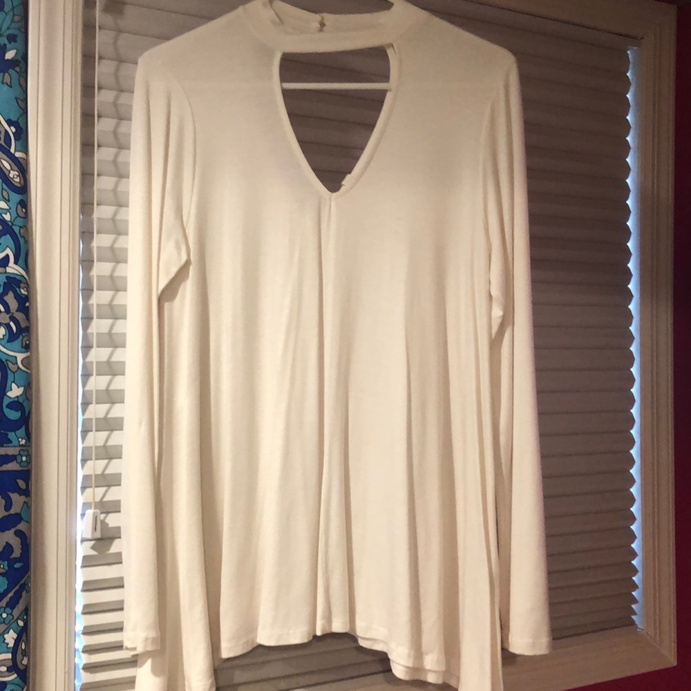 long sleeve shirt, teardrop cut in front and back